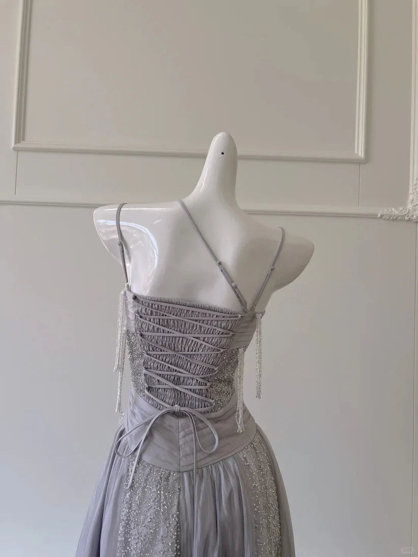 NiceVestidos - Robe de bal longue en tulle à franges et sequins, gris argenté scintillant, coupe trapèze, col licou, NV5950