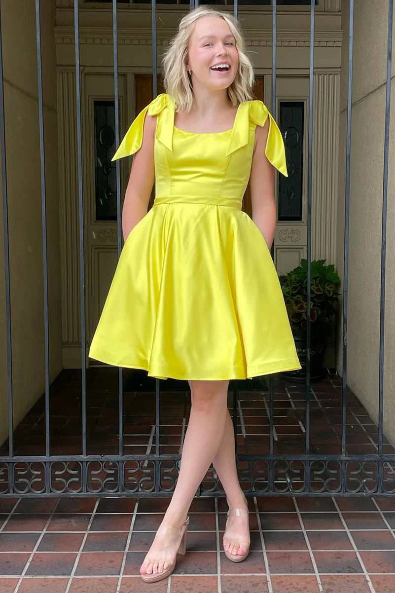 Robe de soirée trapèze jaune à bretelles et nœud papillon nv2084